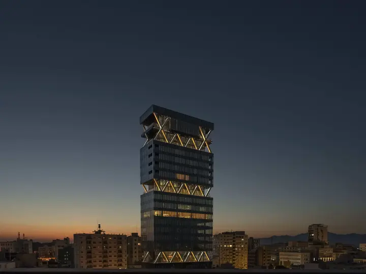 Labs Tower illuminated above the Nicosia skyline