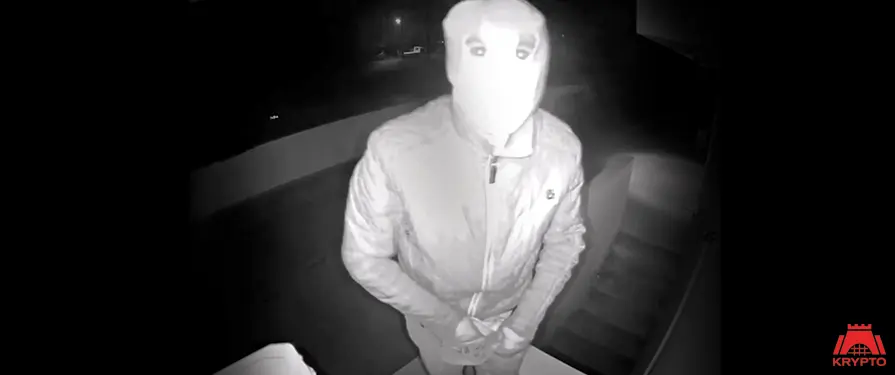 Recorded night-vision image of an intruder at a protected property