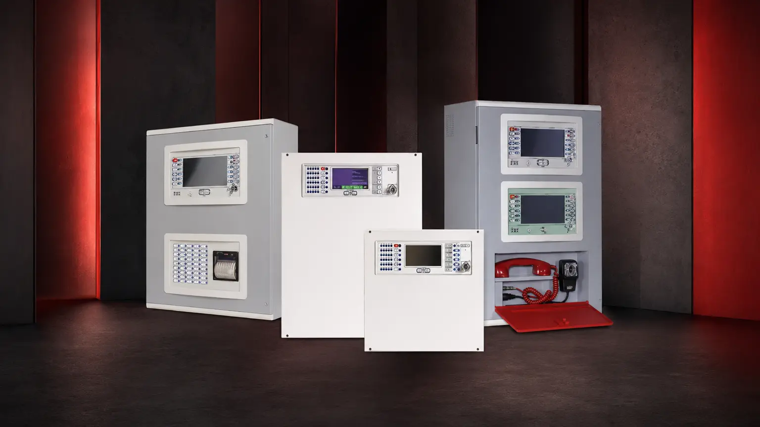 INIM fire alarm control and voice evacuation panels on a coordinated studio background